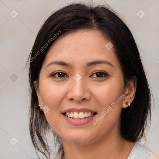 Joyful white young-adult female with medium  brown hair and brown eyes