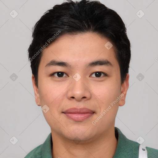 Joyful asian young-adult male with short  black hair and brown eyes