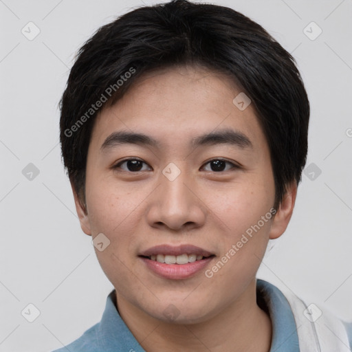 Joyful asian young-adult male with short  black hair and brown eyes