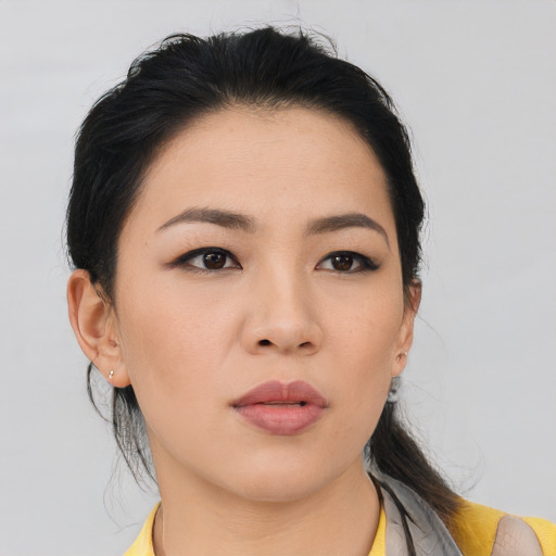 Neutral asian young-adult female with medium  black hair and brown eyes