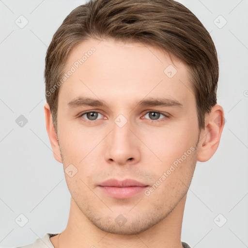 Neutral white young-adult male with short  brown hair and grey eyes