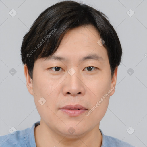 Neutral asian young-adult male with short  black hair and brown eyes