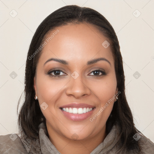 Joyful latino young-adult female with long  brown hair and brown eyes