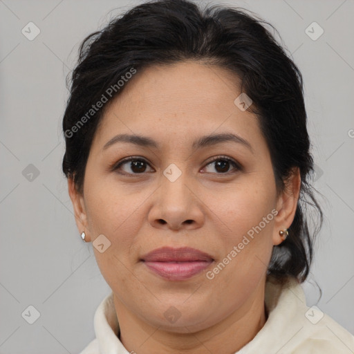 Joyful asian adult female with medium  brown hair and brown eyes