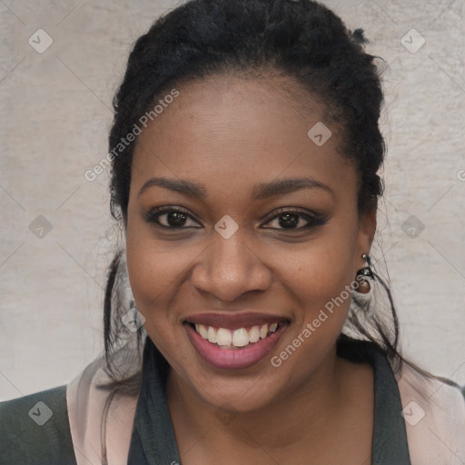 Joyful black young-adult female with long  black hair and brown eyes