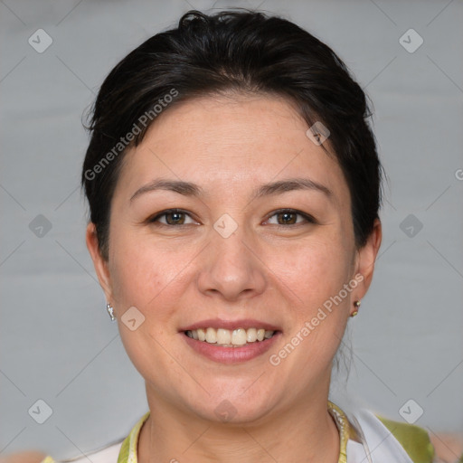 Joyful white adult female with short  brown hair and brown eyes