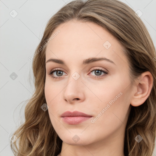 Neutral white young-adult female with long  brown hair and blue eyes