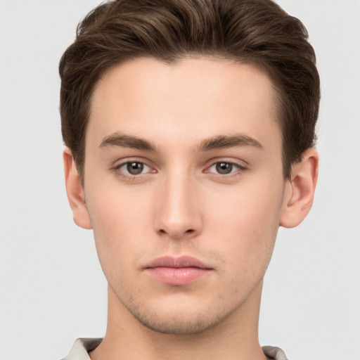 Neutral white young-adult male with short  brown hair and brown eyes