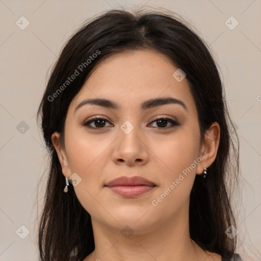 Joyful asian young-adult female with long  brown hair and brown eyes