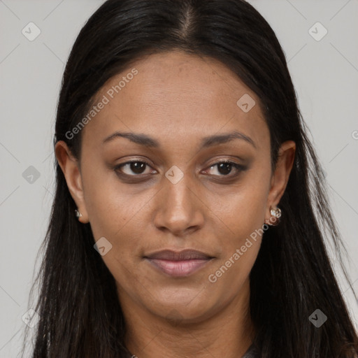 Joyful black young-adult female with long  brown hair and brown eyes