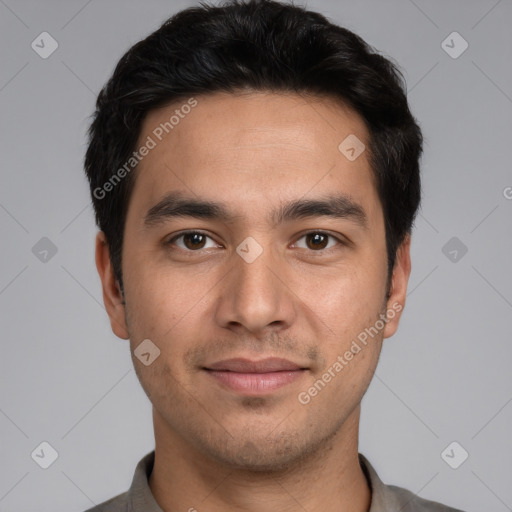 Joyful white young-adult male with short  black hair and brown eyes