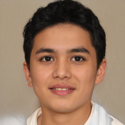 Joyful latino young-adult male with short  brown hair and brown eyes