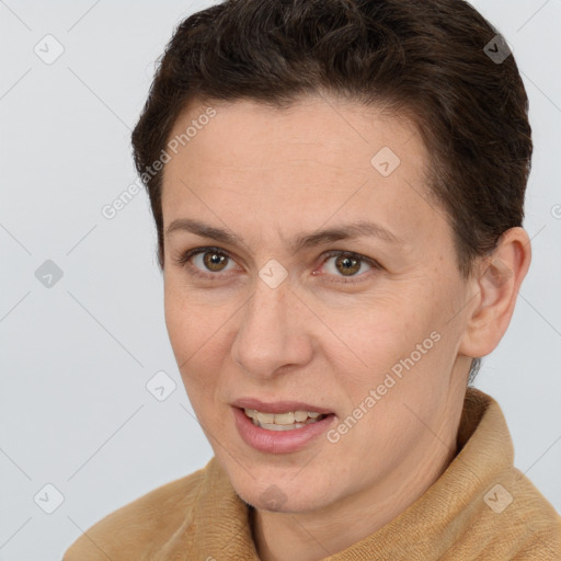 Joyful white adult female with short  brown hair and brown eyes