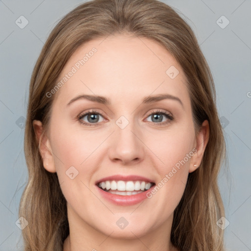 Joyful white young-adult female with long  brown hair and grey eyes