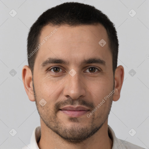 Joyful white young-adult male with short  brown hair and brown eyes