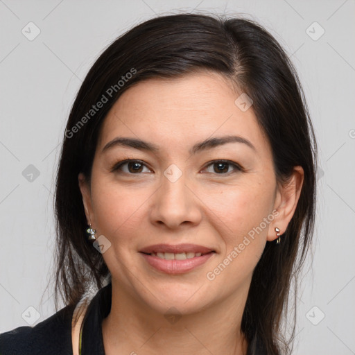 Joyful white young-adult female with long  brown hair and brown eyes