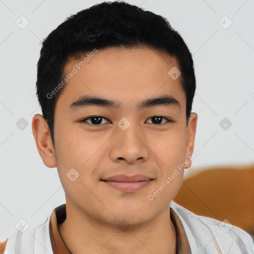 Joyful asian young-adult male with short  brown hair and brown eyes