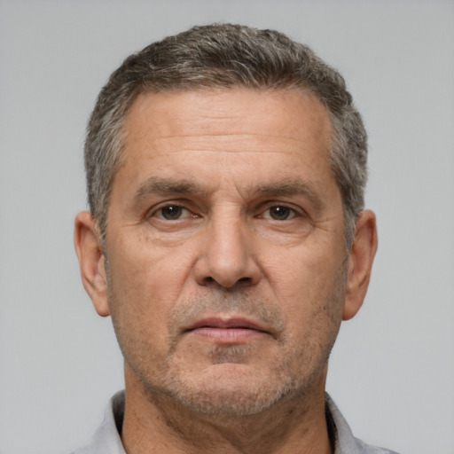 Neutral white middle-aged male with short  brown hair and brown eyes