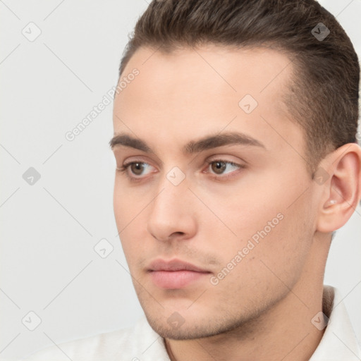 Neutral white young-adult male with short  brown hair and brown eyes