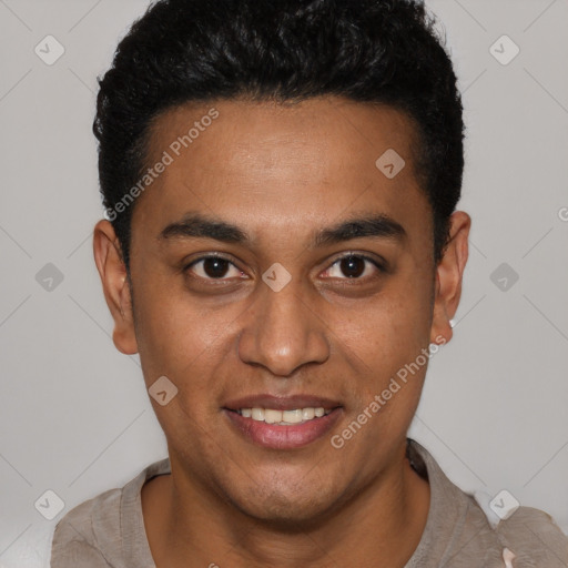 Joyful latino young-adult male with short  black hair and brown eyes