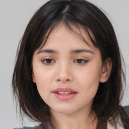 Joyful asian young-adult female with long  brown hair and brown eyes