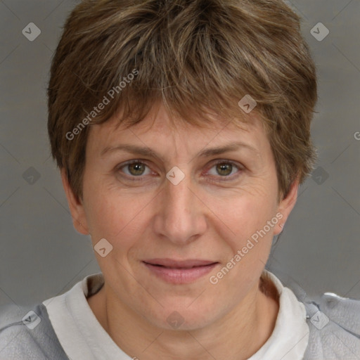 Joyful white adult female with short  brown hair and brown eyes