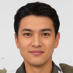 Joyful asian young-adult male with short  black hair and brown eyes