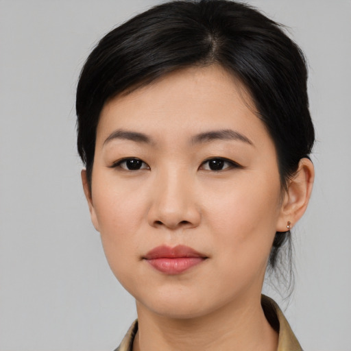 Neutral asian young-adult female with medium  black hair and brown eyes