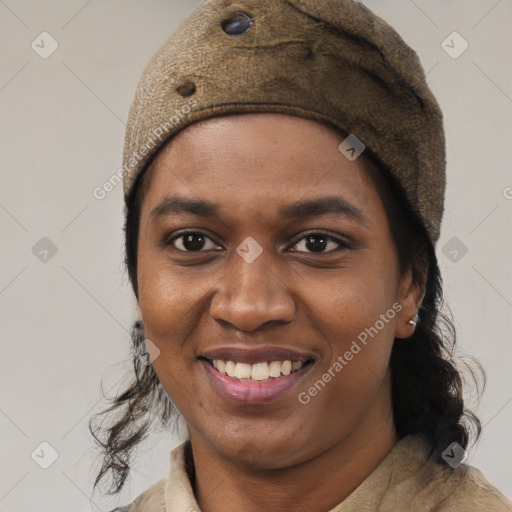 Joyful black young-adult female with medium  black hair and brown eyes