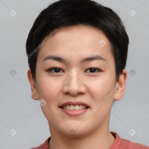 Joyful asian young-adult female with short  brown hair and brown eyes