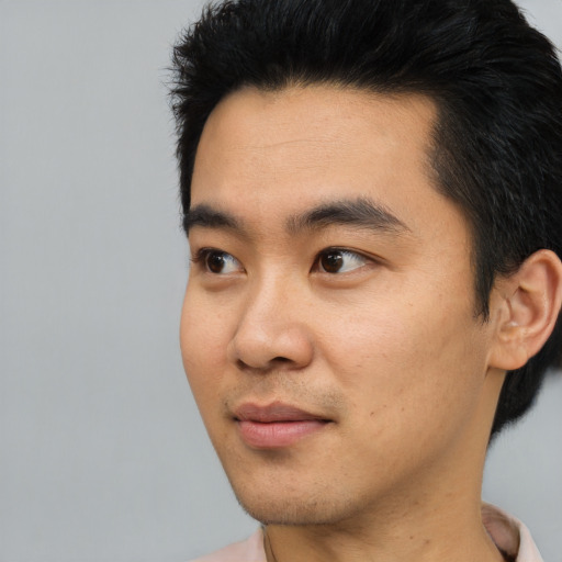Neutral asian young-adult male with short  black hair and brown eyes