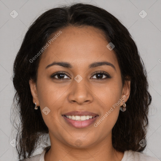 Joyful latino young-adult female with medium  brown hair and brown eyes