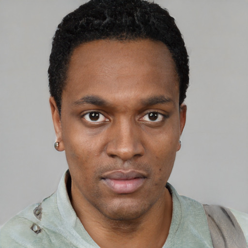Neutral black young-adult male with short  black hair and brown eyes