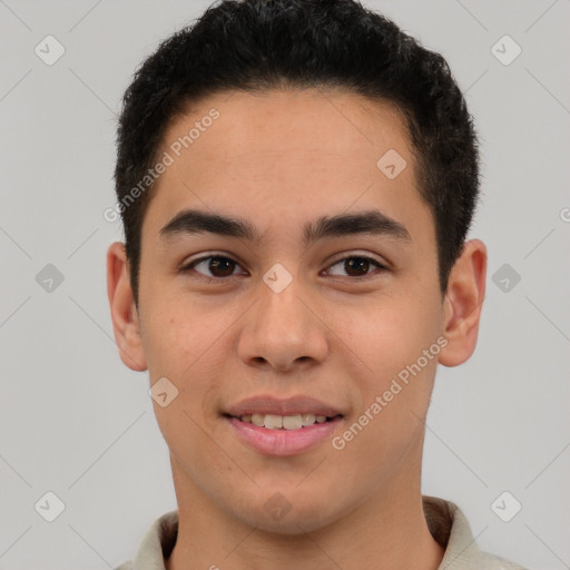 Joyful latino young-adult male with short  brown hair and brown eyes