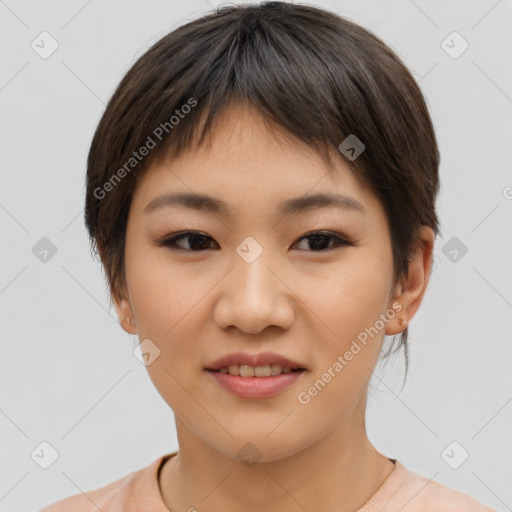 Joyful asian young-adult female with short  brown hair and brown eyes