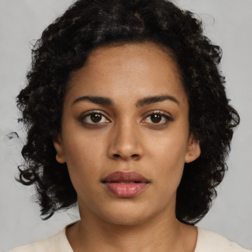 Neutral latino young-adult female with medium  black hair and brown eyes