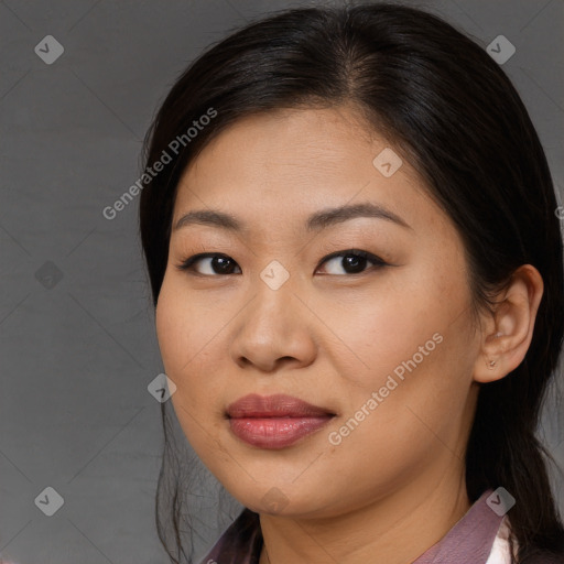 Joyful asian young-adult female with medium  brown hair and brown eyes