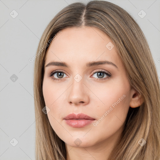 Neutral white young-adult female with long  brown hair and brown eyes