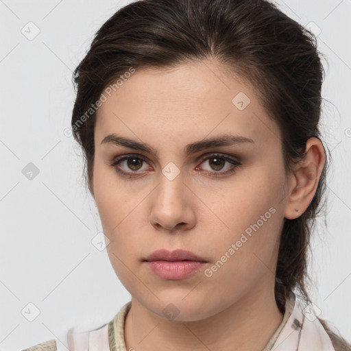 Neutral white young-adult female with medium  brown hair and brown eyes