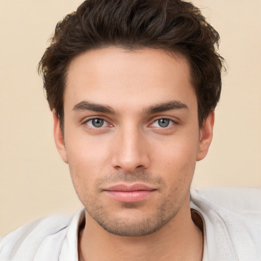 Neutral white young-adult male with short  brown hair and brown eyes