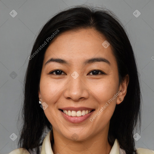 Joyful asian young-adult female with medium  brown hair and brown eyes