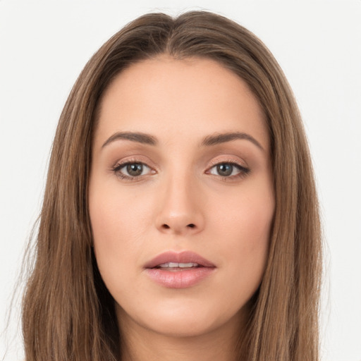 Neutral white young-adult female with long  brown hair and brown eyes