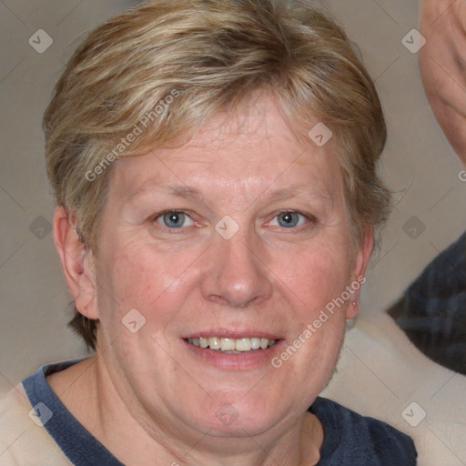 Joyful white adult female with medium  brown hair and blue eyes