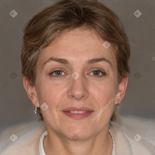 Joyful white adult female with short  brown hair and brown eyes