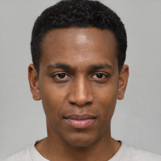 Neutral black young-adult male with short  black hair and brown eyes
