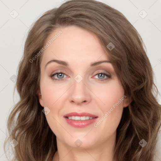 Joyful white adult female with long  brown hair and grey eyes