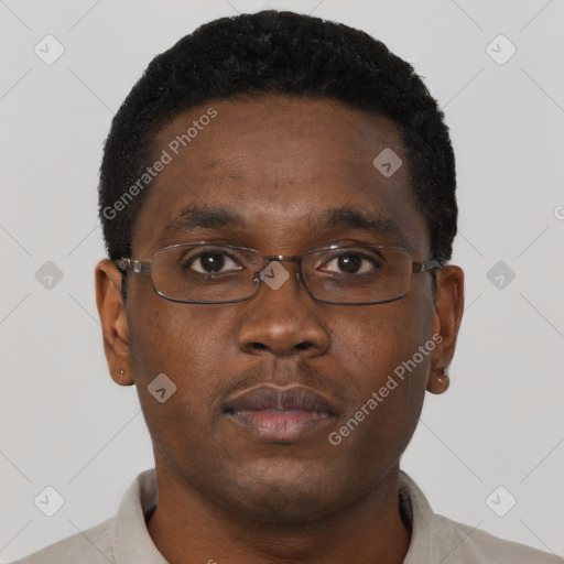 Neutral black young-adult male with short  brown hair and brown eyes