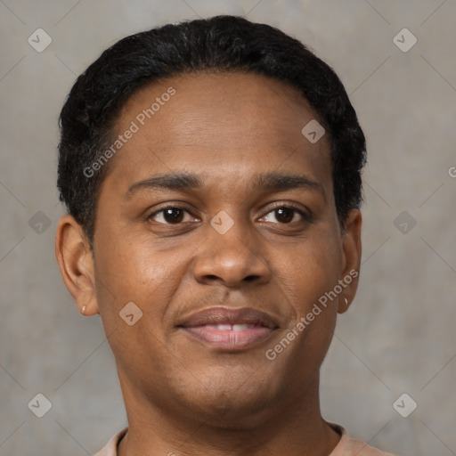 Joyful black young-adult male with short  brown hair and brown eyes