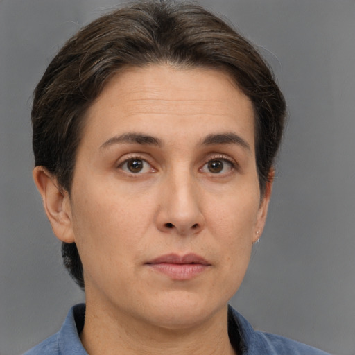 Neutral white adult female with short  brown hair and brown eyes