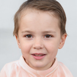 Joyful white child female with short  brown hair and brown eyes